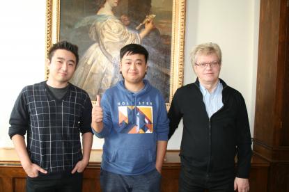 Stefan Olsson, Li Chang och Christer Zeeck som anvarar för utbytet med Beijing